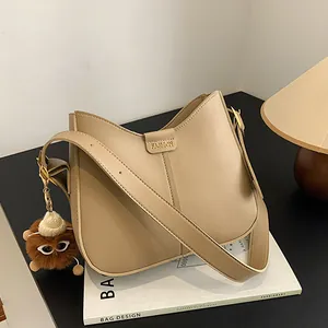 Retro PU Leather Bucket Shoulder Bag For Women Fashion Simple Crossbody Bag With Plush Monster Charm Solid Color Hobo Bag