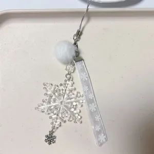 Winter snowflake charm with acrylic pendant, faux fur ball and printed ribbon keychain