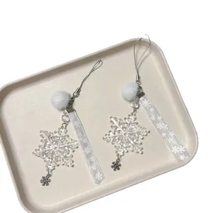 Winter snowflake charm set with plush ball and ribbon for phone or bag decoration