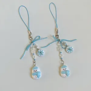 Winter snowman phone charms set with blue resin pendants and beaded snowflakes