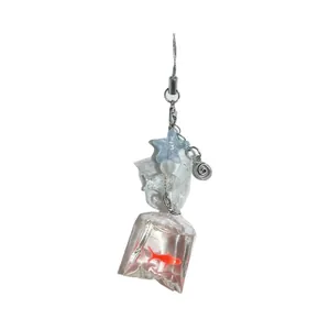 Creative handmade phone charm featuring a realistic red fish in a clear water bag pendant