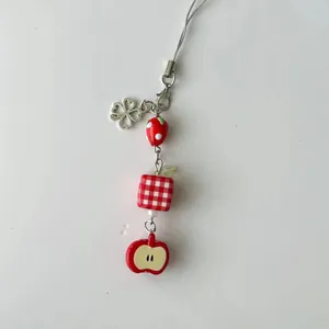 Handmade fruit beaded phone charm with strawberry, apple and clover pendants