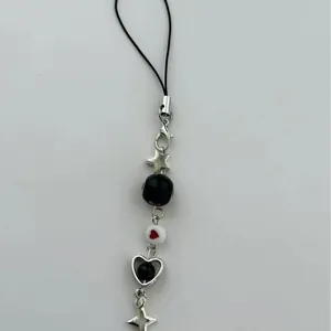 Y2K handmade beaded phone strap with silver heart charm and black star pendant