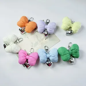 Handmade fabric bow heart pendants in seven colors with silver metallic charms