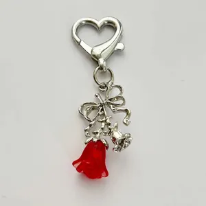 Red resin rose and silver bow keychain with a heart lobster clasp for handbag charm