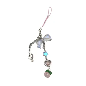 Pink bow and heart beaded phone strap charm with musical note and star pendants