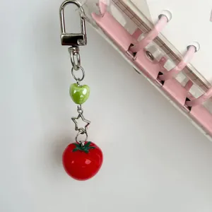 Cute tomato phone charm with red resin fruit, green heart bead and silver star pendant