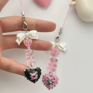 Handmade beaded heart and bear phone charm with ribbons in gothic sweet style