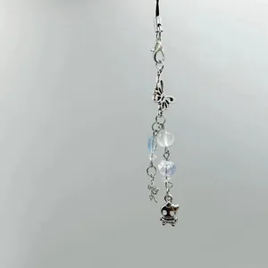 Y2K silver beaded phone charm with hollow butterfly star and skull pendants
