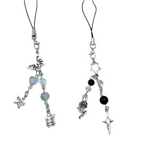 Y2K aesthetic beaded phone charms with silver star, butterfly and skull motifs