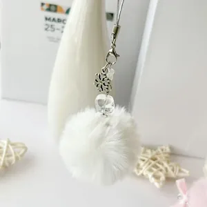 Handmade white plush ball charm with silver snowflake pendant and crystal bead