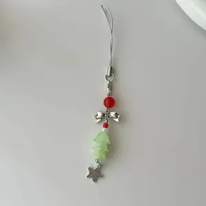 Bijou de téléphone sapin de Noël avec pendentif vert, perle rouge et breloque étoile argentée