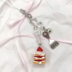 Handmade strawberry cake charm with silver fork pendant and white heart beads on a strap
