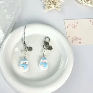Simpatico portachiavi a pupazzo di neve con cappello blu per regalo di Natale decorativo