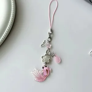Pink handmade koi fish pendant with wing and star charms for phone and bag decor