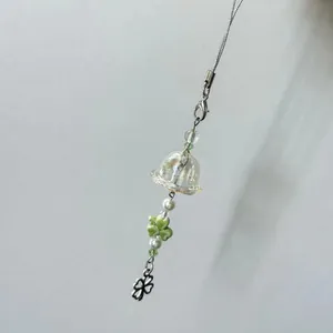 Handmade clover phone charm with clear bell beads and pearls for bag decoration