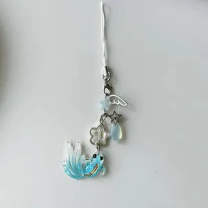 Blue koi fish charm with silver wings and star beads for phone or bag strap