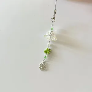 Handmade Beaded Four-Leaf Clover Phone Charm Lucky Bell Bag Pendant Green White Beads Acrylic Alloy Jewelry Accessory
