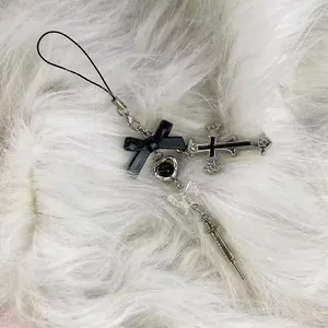 Y2K gothic butterfly cross syringe phone strap with heart pendant on white fur