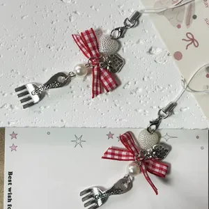Pastel heart and bow beaded phone charm with Enough metal fork and strawberry pendant
