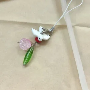 Minimalist handmade bird and pink flower beaded charm for phone and bag accessories
