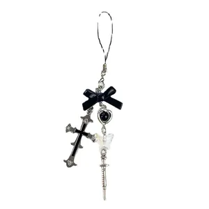 Y2K style butterfly cross syringe keychain and phone charm in black and silver