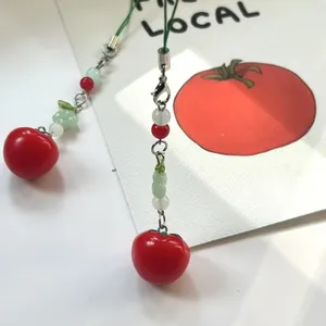 Creative red tomato charm with colorful beads and green lanyard for bags and phones