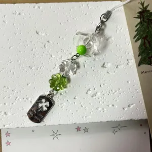 Lucky four-leaf clover beaded phone strap with metal charm engraved You Are My Lucky