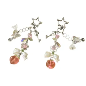 Charmant pendentif de téléphone pêche et étoile avec nœud et papillon coloré