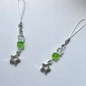 Fresh green lucky star beaded phone strap with clover charms and lobster clasp charm