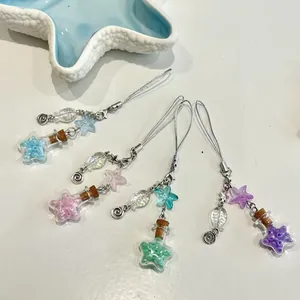 Colgantes para móvil con botella de deseo de estrella y cuentas de concha en cuatro colores