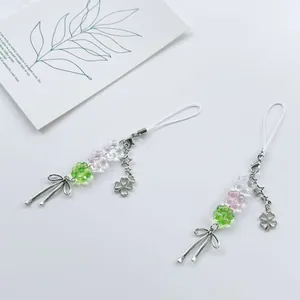 Cordon de téléphone perlé avec trèfle et nœud en alliage rose et vert style doux