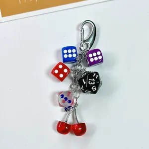 Creative cherry keychain with multi-colored acrylic dice and classic metal lobster clasp