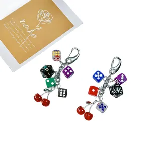 Creative cherry and irregular dice keychain set with colorful resin charms on silver chains