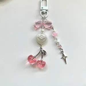 Süße Kirsch-Perlenkette für Handys mit rosa Schleife und Sternanhänger für Taschen