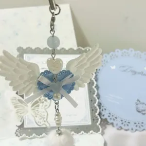 Pendentif cœur ailes d'ange Y2K avec dentelle bleue et perles pour sacs et clés