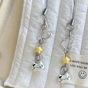 Cute handmade beaded phone charms with white cat heads and yellow stars, set of two