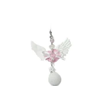 Pink heart angel wing phone charm with white ribbon bow and soft fluffy plush ball