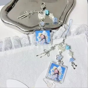 Acrylic manga photo frame keychain with blue beads and silver charms for bags and phones