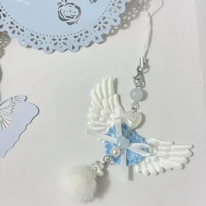 Porte-clés Cœur Ailes d'Ange Y2K Bijou de Sac Avec Nœud en Dentelle Künstliche Perle de Culture Boule de Peluche Kawaii Doux Pendentif Pour Femmes Filles Accessoires
