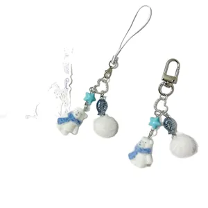 Creative flocked polar bear keychain and phone strap set with blue scarf and star