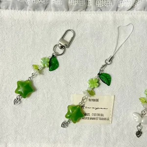 Forest style lucky green four-leaf clover beaded keychain with heart pendant and star beads