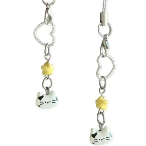 Cat themed beaded charms with white cat pendant and yellow star for bags and keys