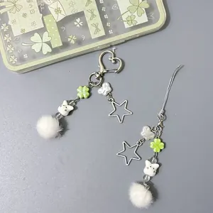 Cute bunny phone charm with green clover beads, metal star pendant and white pompom