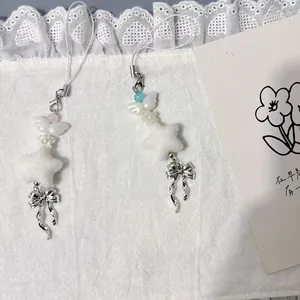 Colgante de Teléfono de Estrella de Peluche Blanco Hecho a Mano Cuentas Alas Copo de Nieve Lazo Colgante de Aleación Llavero