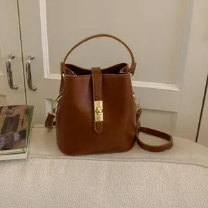 Women Retro PU Leather Bucket Bag Minimalist Crossbody Shoulder Bag With Metal Lock Gold Hardware Daily Fashion Handbag