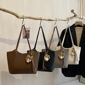 Minimalist large-capacity faux leather tote bag for women in four versatile colors