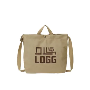 Minimalist khaki canvas tote bag with LOGG geometric print and dual straps