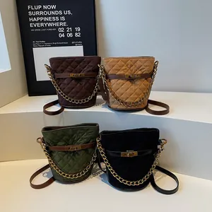 Quilted bucket crossbody bags in dark brown, khaki, green, and black with gold chains
