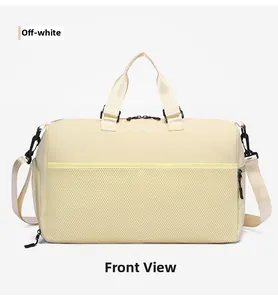 Front detail of large cream travel bag with mesh pocket and adjustable black strap